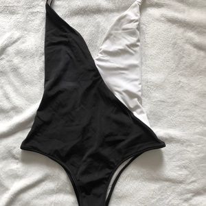 Black one piece swimsuit VS
